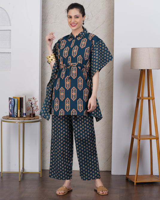 a woman wearing Indian ethnic set in blue with contrast accessories