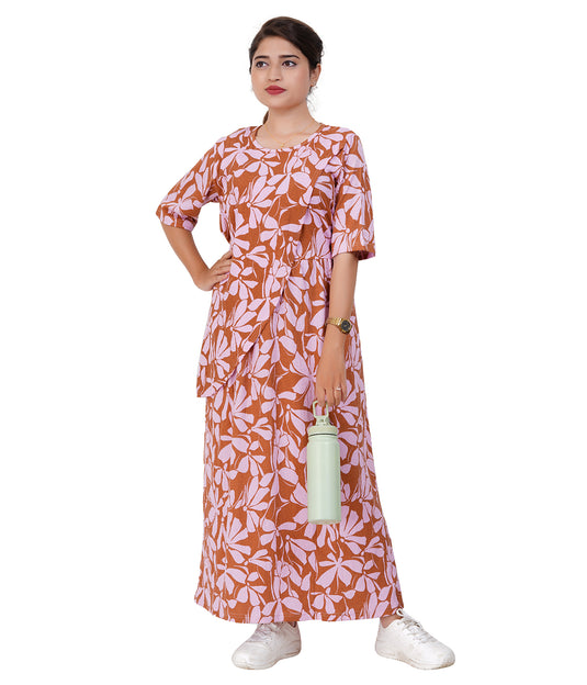 woman standing with bottle wearing floral dress and white shoe