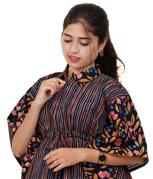 Woman wearing a colorful patterned dress on a white background