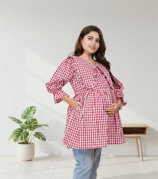 Woman wearing a red and white checkered dress on a white background