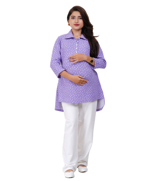 pregnant Woman wearing a purple mini heart top and white pants on a white background